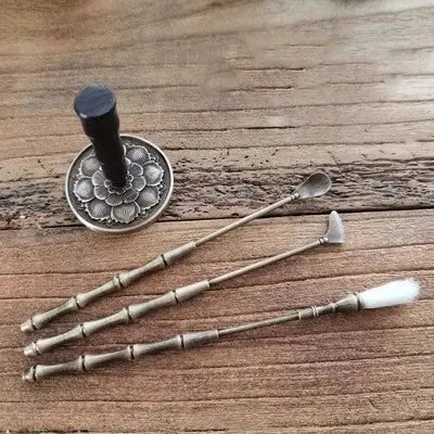 Pelle artisanale pour encens en cuivre.