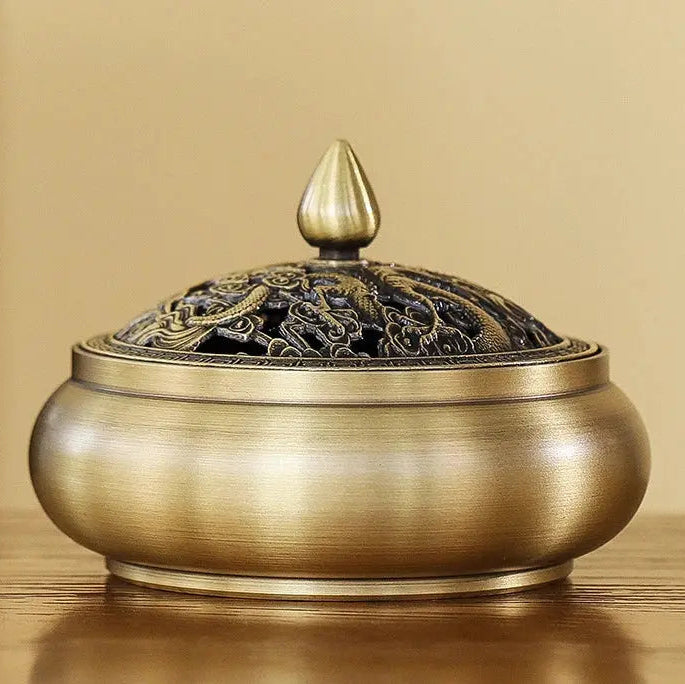 Brûleur d’encens en cuivre ancien, parfait pour ambiance zen.