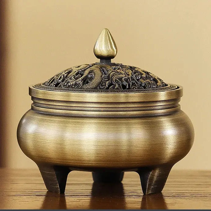 Brûleur d’encens en cuivre tripode, fusion de tradition et modernité.