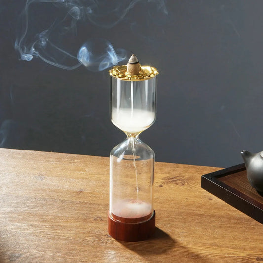 Brûleur encens sablier en verre transparent et lotus doré, effet cascade fumée méditation