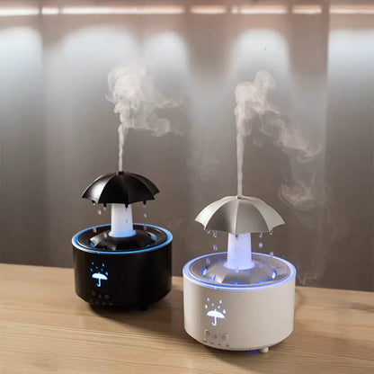 Diffuseur d'huile essentielle Pluie Relaxante noir avec effet pluie simulée et éclairage apaisant.