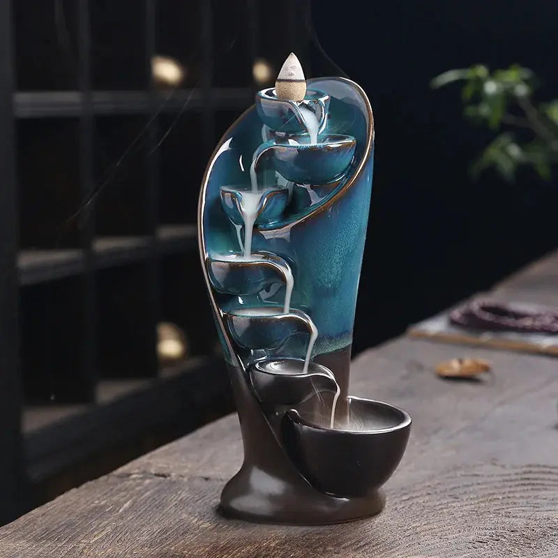 Porte-encens cascade en céramique bleu/gris avec effet fumée relaxant.
