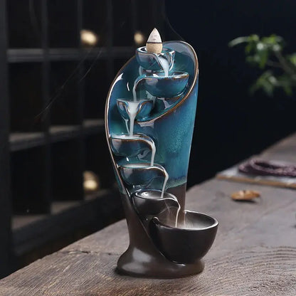 Porte-encens cascade en céramique bleu/gris avec effet fumée relaxant.