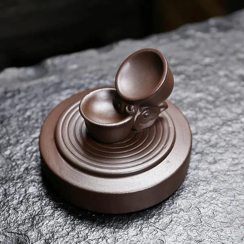 Effet cascade fumée apaisant avec théière en lévitation